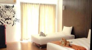 Fotografie z fotogalerie ubytování The Pride Hotel At Laemsing v destinaci Laem Sing + 83 fotografií