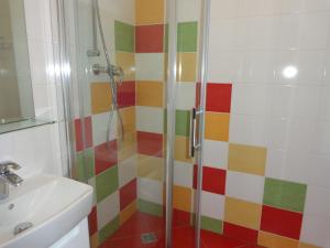 a bathroom with a shower and a sink at Jasna 96 II in Belá