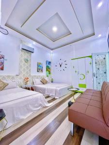Postel nebo postele na pokoji v ubytování Hoàng Nga Apartment Phan Thiết