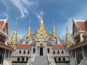 a building with gold spires on top of it at Greenseaview Resort in Chongchang
