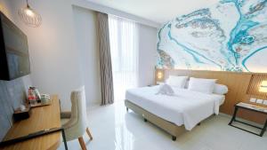 Postel nebo postele na pokoji v ubytování Front One Resort Indraloka Temanggung + 58 fotografií