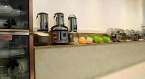 Příslušenství pro přípravu čaje a kávy v ubytování GreenTree Inn Shangrao Yueliangwan Automobile City