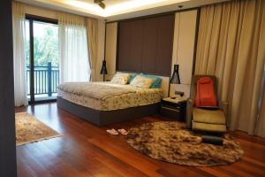 Ένα ή περισσότερα κρεβάτια σε δωμάτιο στο Maha Casa Villa