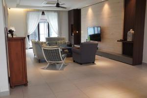 Μια τηλεόραση ή/και κέντρο ψυχαγωγίας στο Maha Casa Villa +18 φωτογραφίες