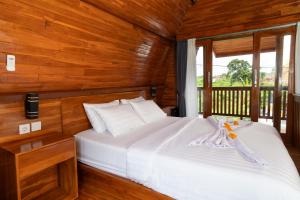 Ένα ή περισσότερα κρεβάτια σε δωμάτιο στο Villa Aditya +23 φωτογραφίες