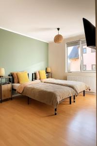 Ένα ή περισσότερα κρεβάτια σε δωμάτιο στο ZiAna - Hiperbara Livezeni