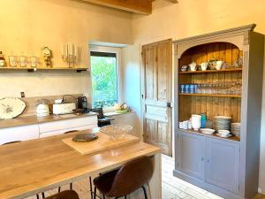 Η κουζίνα ή μικρή κουζίνα στο La Villégiature Laptoise, Calme et Confort