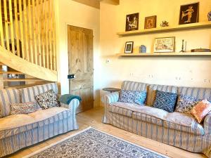 Χώρος καθιστικού στο La Villégiature Laptoise, Calme et Confort