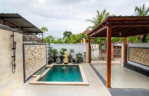 Πισίνα στο ή κοντά στο Villa Aditya