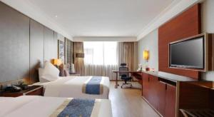 Fotografie z fotogalerie ubytování Echeng Hotel Wuhan Optics Valley Square Yangjiawan Metro Station v destinaci Wu-chan