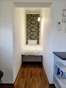 Postel nebo postele na pokoji v ubytování Nikita's Self-catering Haven 2