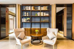 Posezení v ubytování Yitel Collection Beijing Capital Airport New International Exhibition