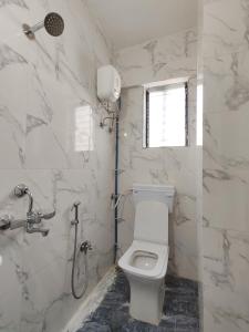 Koupelna v ubytování Hotel Pallavi Inn