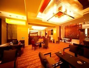 Posezení v ubytování Ramada Plaza by Wyndham Yangzhou Casa