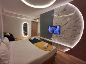 TV a/nebo společenská místnost v ubytování Palette The Moon Hotel Goa