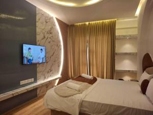 TV a/nebo společenská místnost v ubytování Palette The Moon Hotel Goa