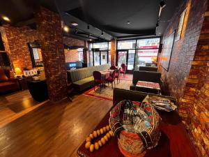 a living room with a couch and a table at Sufi Homes in Konya