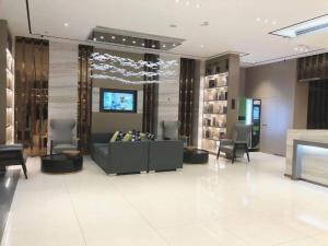 TV a/nebo společenská místnost v ubytování City Comfort Inn Wuhan Baibuting