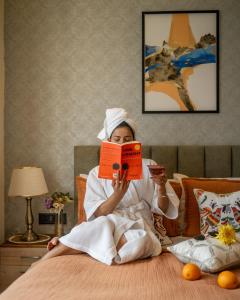 Ένα ή περισσότερα κρεβάτια σε δωμάτιο στο Perfectstayz Premium Pinaaki - Ganges View