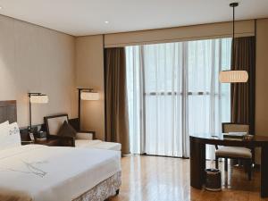 Gallery image of Dujiangyan Xinhua Haiyi Yulei Mountain Residence Hotel in Dujiangyan