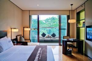 Gallery image of Dujiangyan Xinhua Haiyi Yulei Mountain Residence Hotel in Dujiangyan