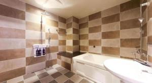 Koupelna v ubytování H Hotel