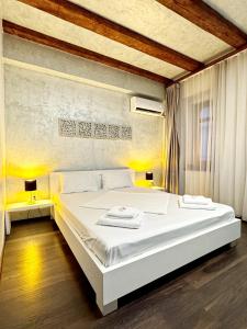 Ένα ή περισσότερα κρεβάτια σε δωμάτιο στο FLH - Sibiutiful