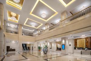 a lobby of a hotel with a large building at Kempinski Hotel Guiyang in Guiyang
