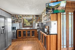 Kuchyň nebo kuchyňský kout v ubytování Coffs Coast Mountain Retreat - House + 9 fotografií