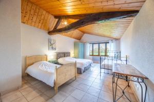 Postel nebo postele na pokoji v ubytování Gite à La Ferme