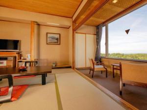 TV a/nebo společenská místnost v ubytování Oga Kanko Hotel