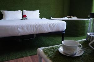 Posteľ alebo postele v izbe v ubytovaní Jacuzzi Rooms