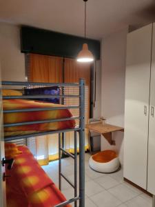 Ένα ή περισσότερα κρεβάτια σε δωμάτιο στο Appartamento Santa Barbara