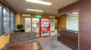 TV a/nebo společenská místnost v ubytování Business Hotel Shinkawa Ube