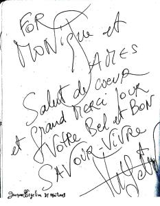 a handwritten document with handwriting on a sheet of paper at Le Grand Monarque in La Charité-sur-Loire
