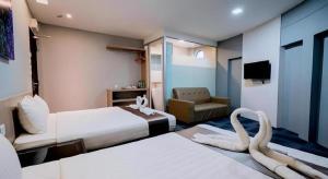 TV a/nebo společenská místnost v ubytování Kimal Hotel Taiping