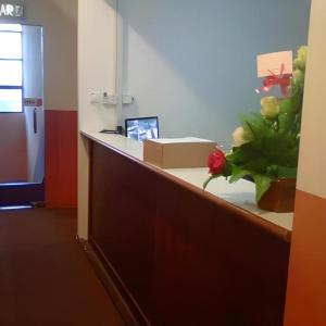 Kuchyň nebo kuchyňský kout v ubytování OYO 90785 Pandan Hotel