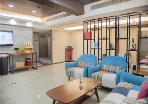 Posezení v ubytování Borrman Hotel Zhenjiang Dashikou Suning Plaza