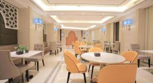 Posezení v ubytování Jinjiang Inn Select Urumqi Midong Avenue