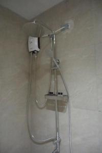 Ένα μπάνιο στο Verdant Villas at Eleve' Homes +4 φωτογραφίες