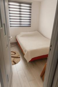 En eller flere senge i et værelse på Lookout Szécseny Lodge