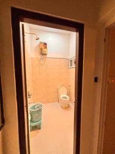 Koupelna v ubytování Rajkamal Hampi