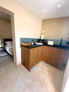 Kuchyň nebo kuchyňský kout v ubytování Studio Lou