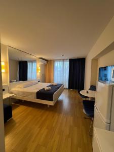 Ένα ή περισσότερα κρεβάτια σε δωμάτιο στο Orbi City Apartment with sea view +48 φωτογραφίες