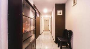 TV a/nebo společenská místnost v ubytování OYO 89465 Golden Lounge + 94 fotografií