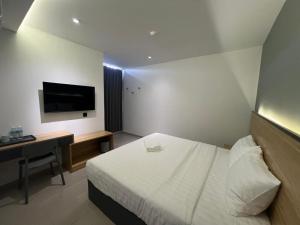 Postel nebo postele na pokoji v ubytování Hotel M9 Sepang KLIA & KLIA 2