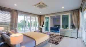 Posezení v ubytování Platinum Pool Villa