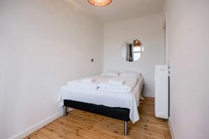 Postel nebo postele na pokoji v ubytování Charming Hellerup Residence