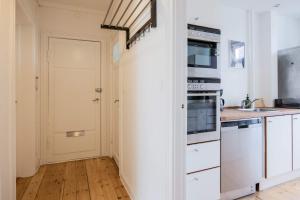 Kuchyň nebo kuchyňský kout v ubytování Charming Hellerup Residence + 12 fotografií
