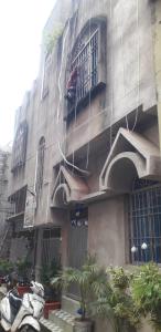 a building with motorcycles parked in front of it at AC Comfort Guest House in Deoghar